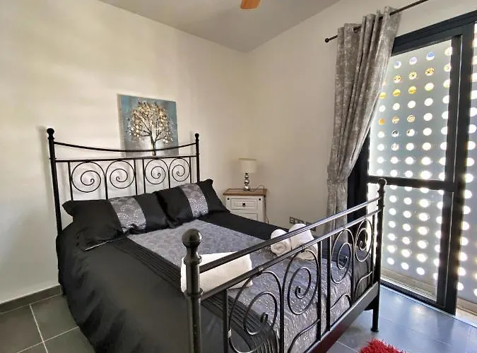 Апартаменты La Caleta Penthouse Адехе